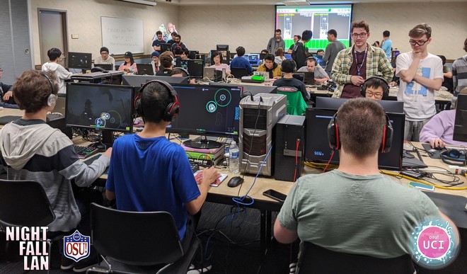 Photo of the NFL event room showing Vaxei and fieryrage playing in a multi lobby